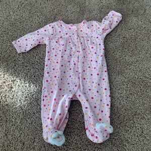 Absorbs pink onesie.